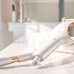Styling with a hair dryer for fine hair, showcasing modern design and features.